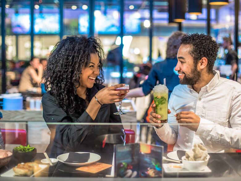 Couple having a cocktail in Ping Pong restaurant at the Southbank Centre