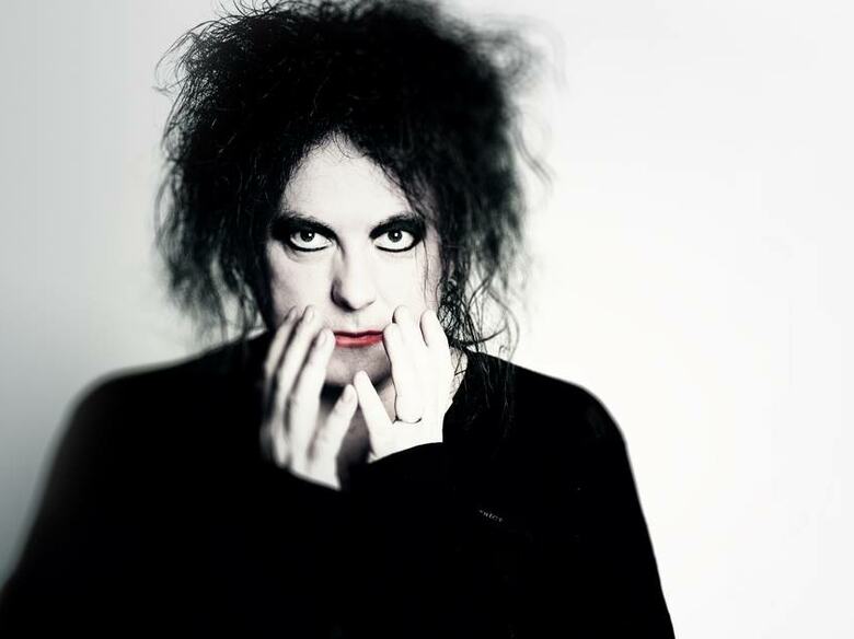 Robert Smith from the band The Cure.