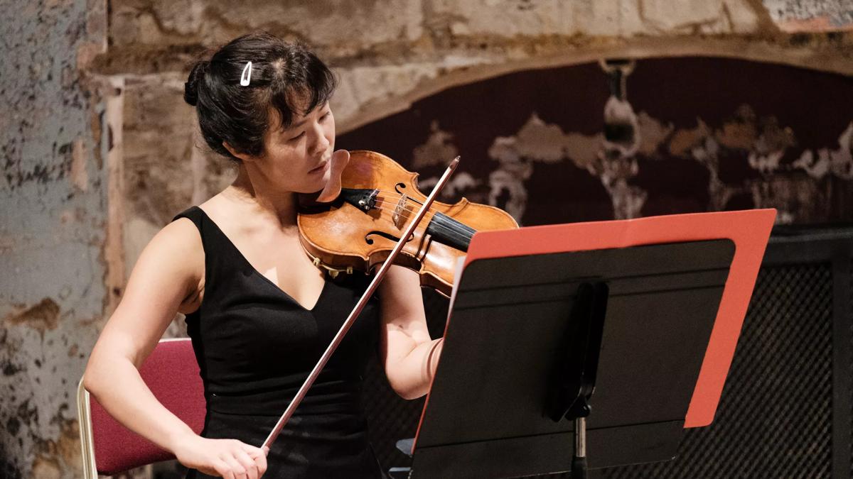 Rebecca Chan playing the violin