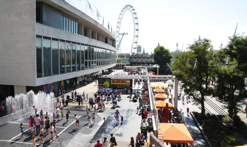 Aerial views of the Southbank Centre including fountain, visitors and the London Eye