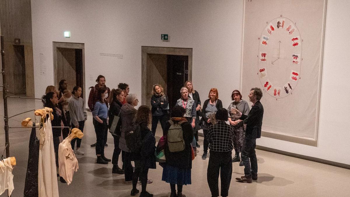 Teachers having a tour of the Louise Bourgeois Exhibition as part of the Teachers' Twilight event