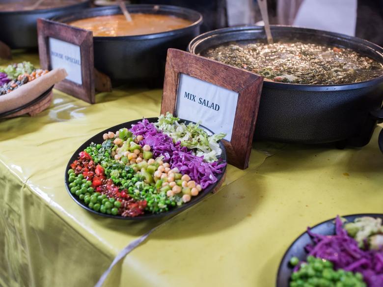 A photo of salads and stews at the Ethiopian food stall Ethiopiques, at Southbank Centre Food Market