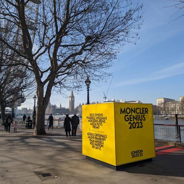 A yellow cube by the River Thames with Big Ben in the background.