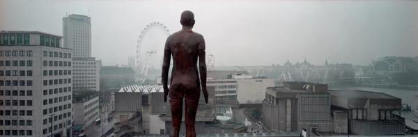 Figure of Man with View of London Eye by artist, Antony Gormley at Hayward Gallery