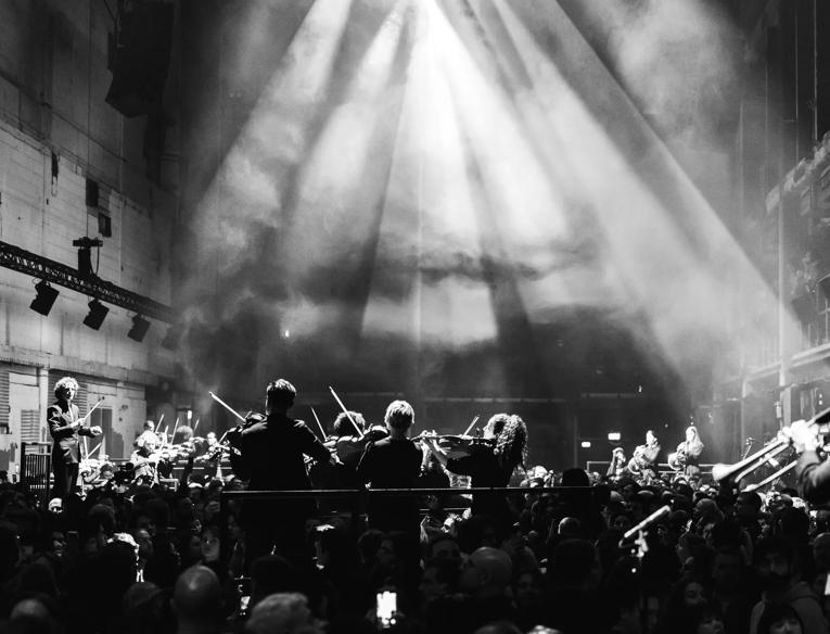 Black and white image of Aurora Orchestra performing Beethoven at Printworks