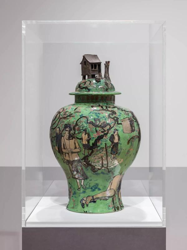 Installation view of Grayson Perry's green vase in a glass case, Strange Clay: Ceramics in Contemporary Art at the Hayward Gallery 