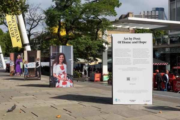 Art by Post artworks on billboards on Queens walk. Art by Post: Of Home and Hope, Southbank Centre, 2021