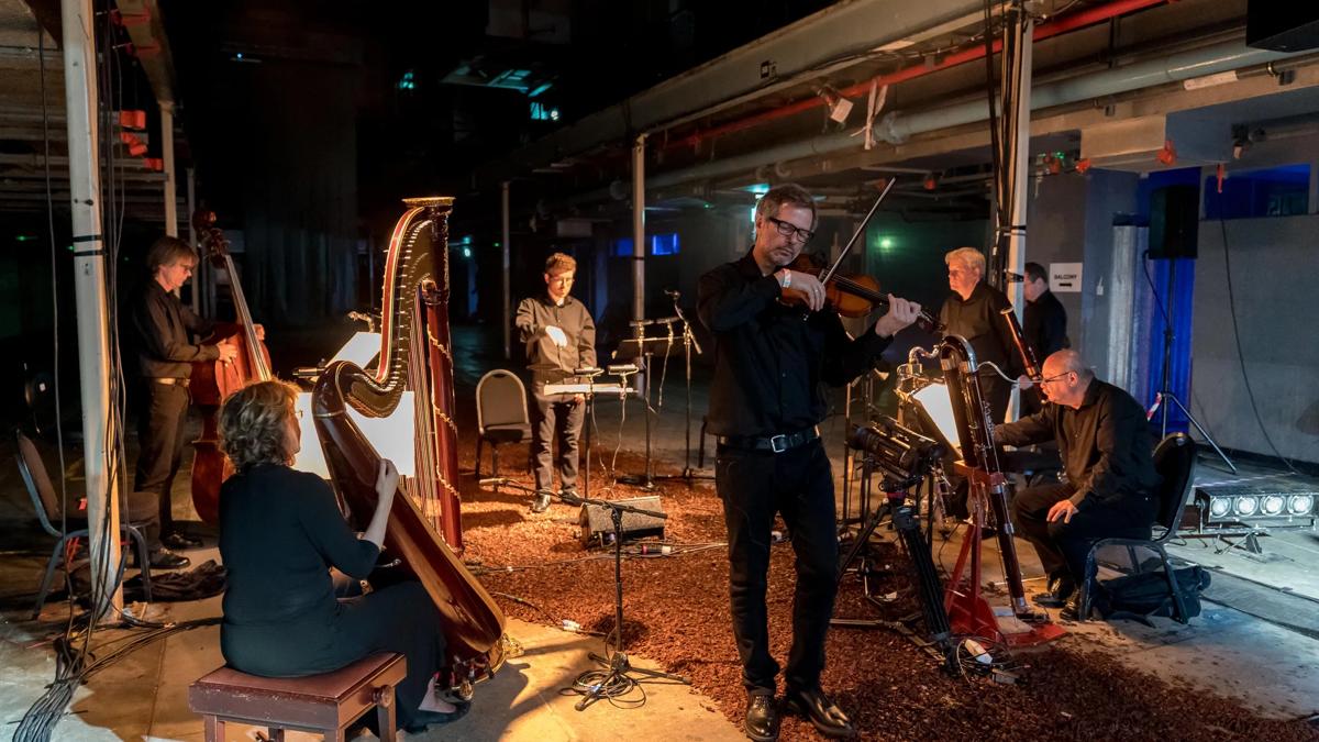 London Sinfonietta orchestra performing backstage 