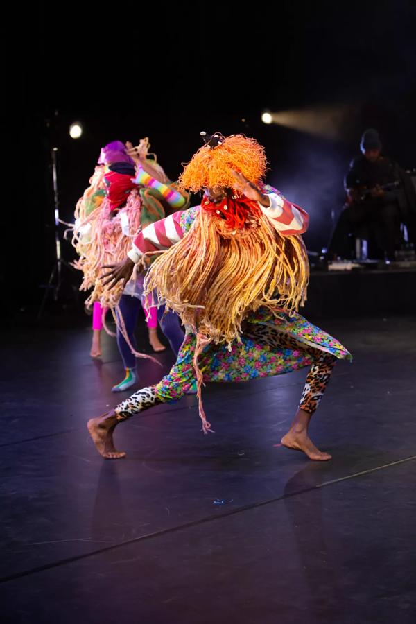 A dancer performs on a stage