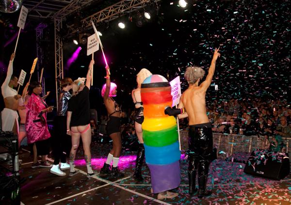Trans Filth and Joy on stage with glitter