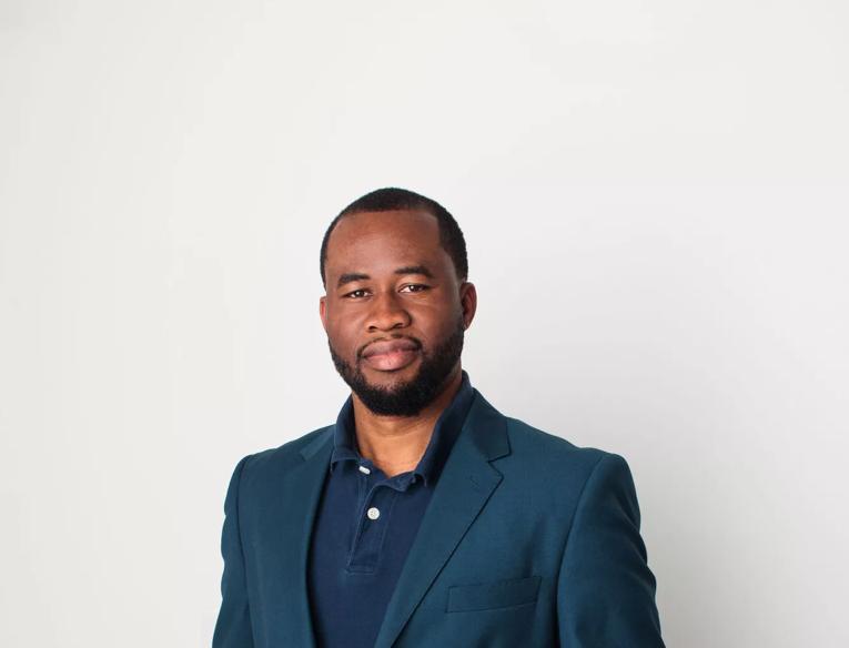 Chigozie Obioma wearing a blue suit