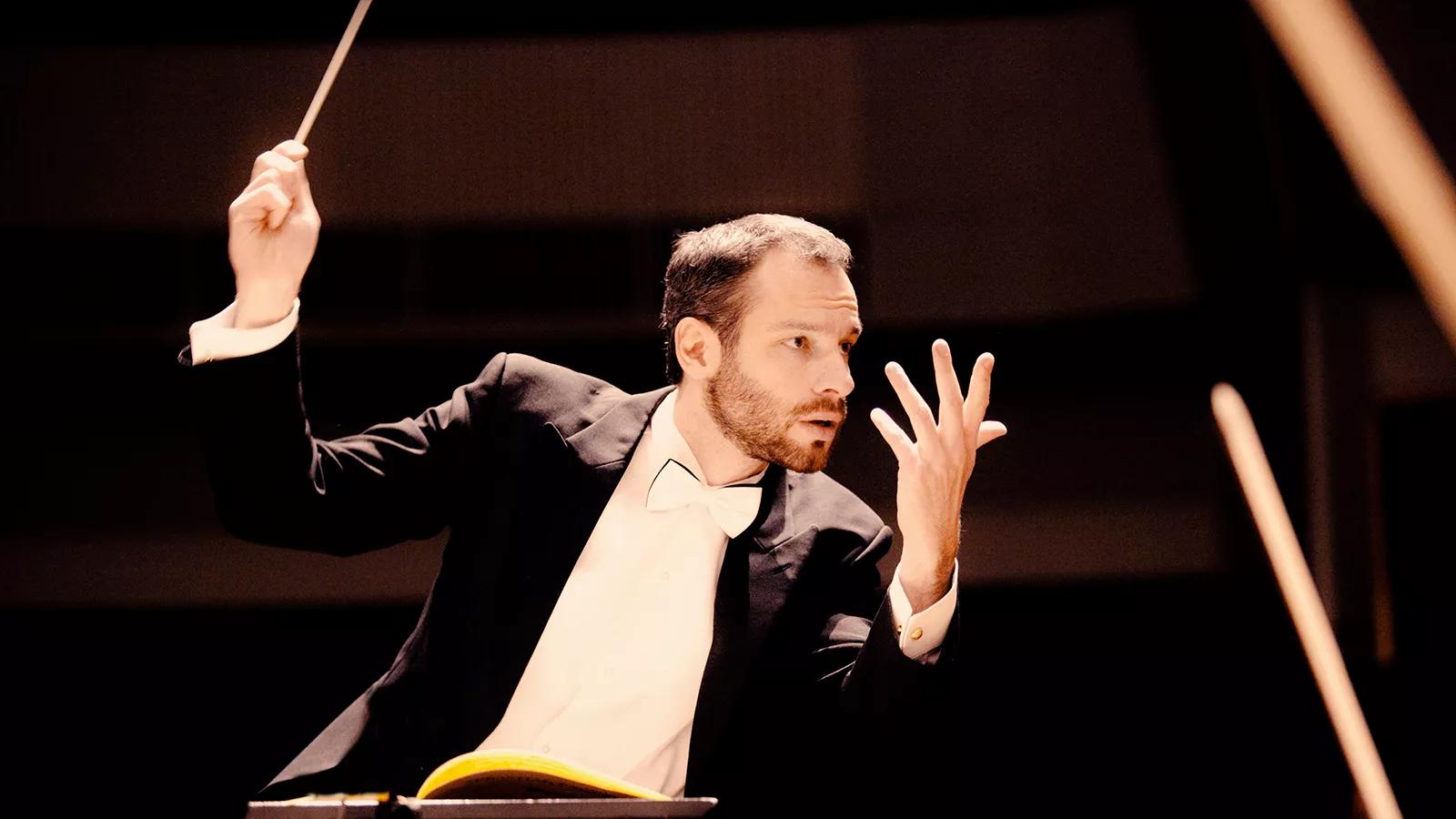 Orchestra conductor. Conductor. Symphony conductor. Live conductor.