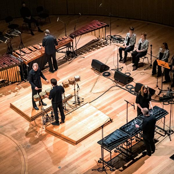 Percussionists on a wooden stage