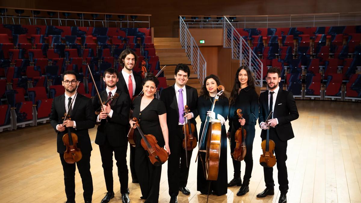 A group of string musicians. 