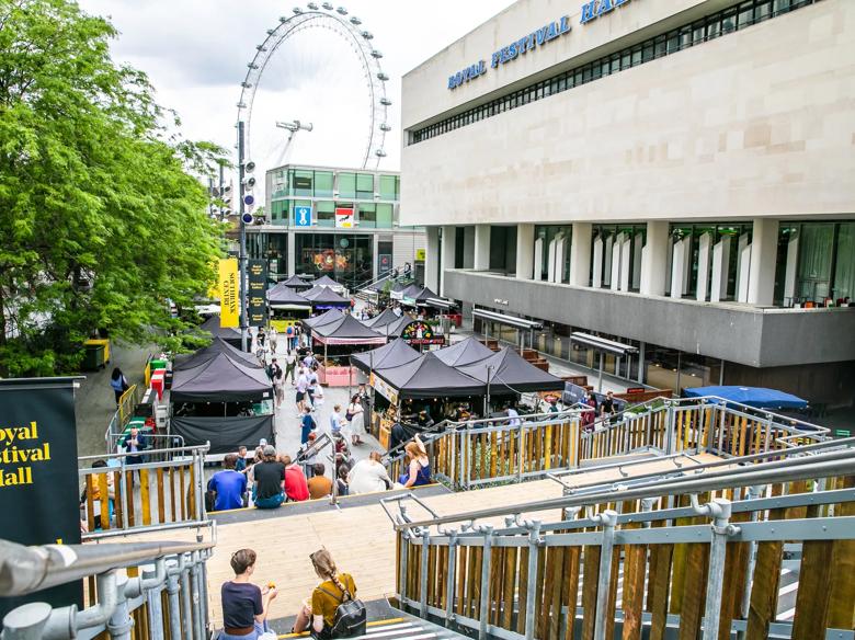 People enjoying the Southbank Centre Food Market