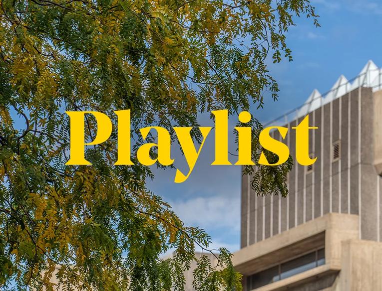 The word Playlist in yellow type over an image of the exterior of the Hayward Gallery fringed by a tree