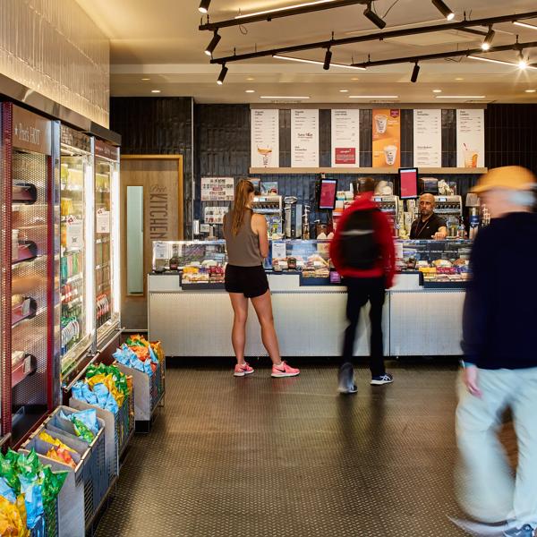 Pret A Manger interior with customers browsing the selection of food and drink