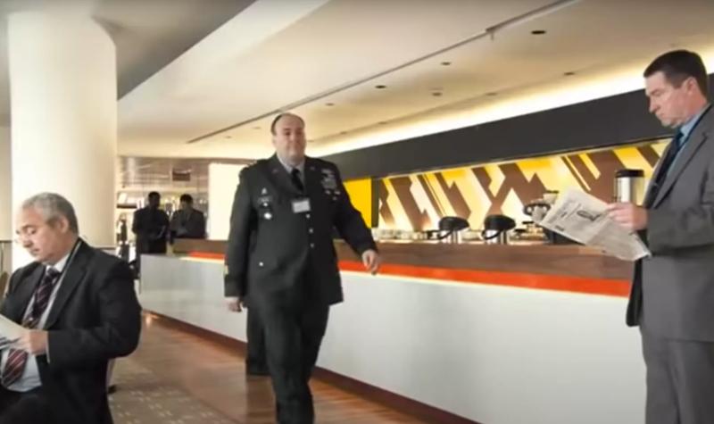James Gandolfini walks past one of the Royal Festival Hall bars in a scene from film In The Loop