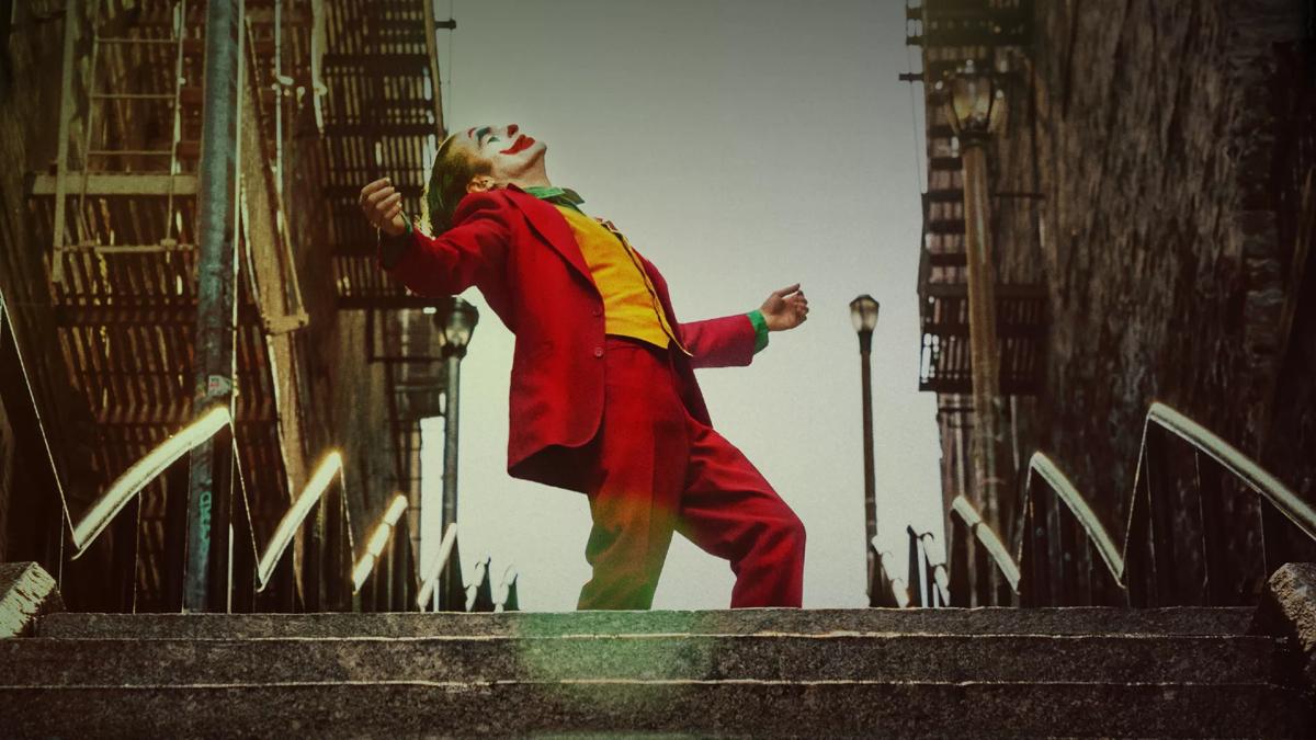 The Joker laughing in a red jacket  