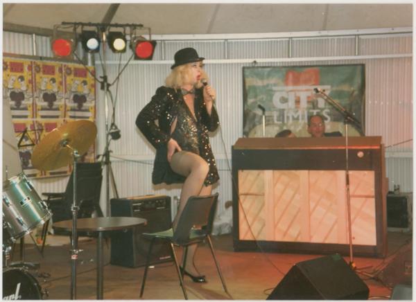 Drag artist David Dales performs in the cabaret tent at Pride '87 Carnival at London South Bank