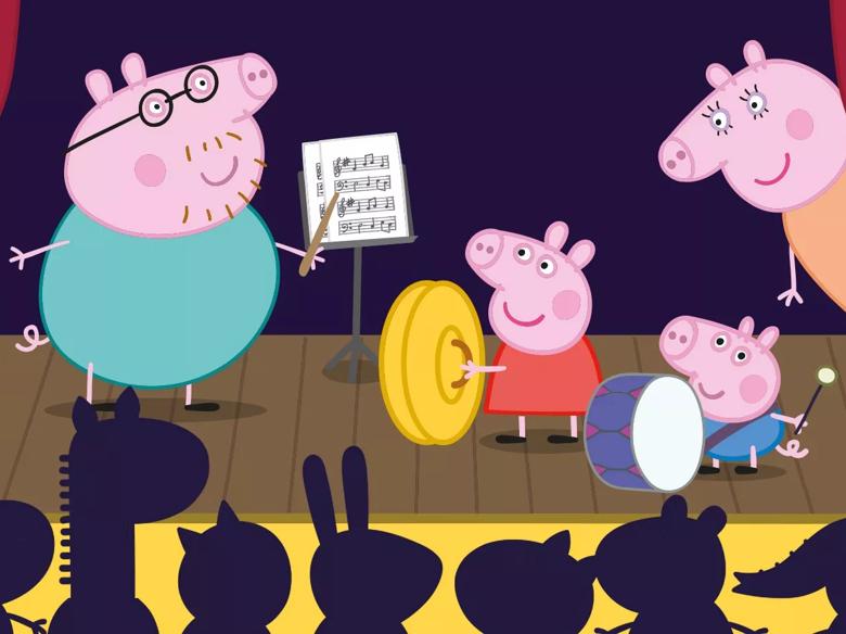 Peppa Pig and family performing on stage