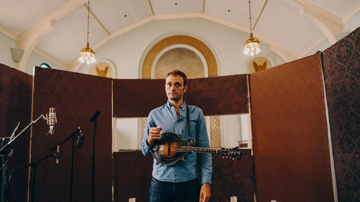 Musician Chris Thile on stage