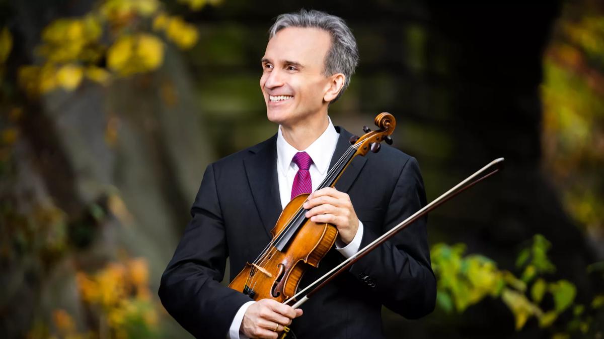 Gil Shaham, photographed at Central Park with a violin