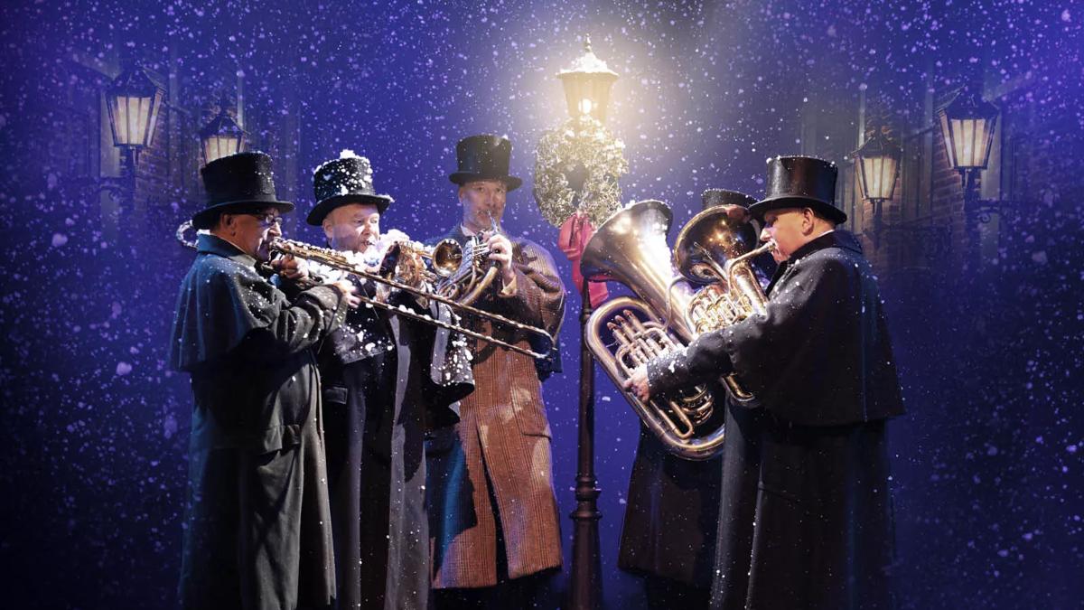 A Dickensian Christmas, brass players under a falling snow