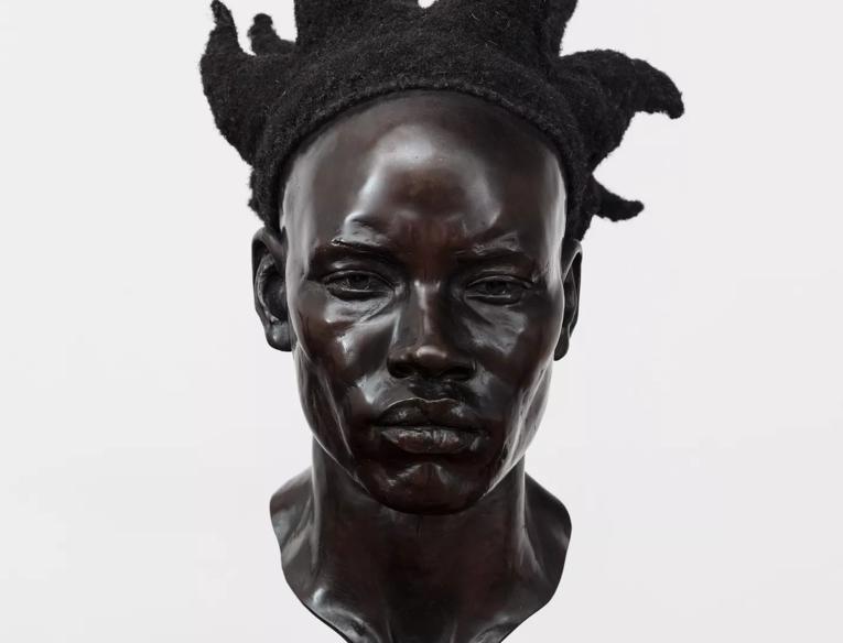 Tavares Strachan, A Map of the Crown (Congo Candle Wick), 2022. Bronze, human hair, wood. 