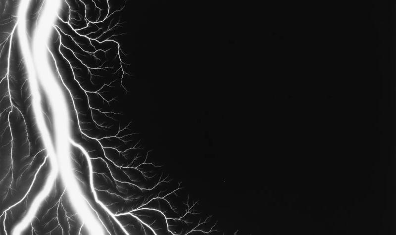 A black and white photo of a lightening bolt