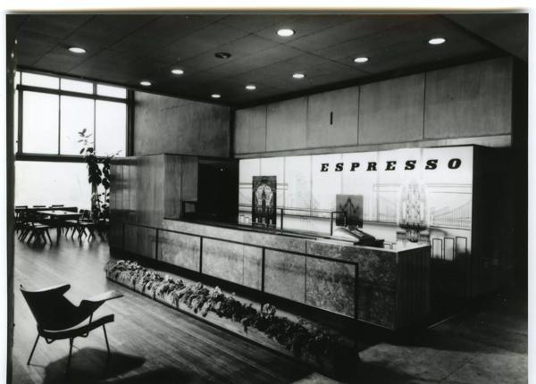 The interior of the Royal Festival Hall in 1954, a sleek new contemporary designed Espresso Bar with metallic backdrop and wood panelled counter