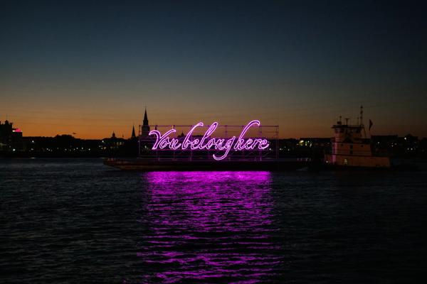 Tavares Strachan, You Belong Here, Prospect.3 New Orleans, 2014. (Installation view from Prospect 3 Biennale, New Orleans, LA). Blocked out neon travelling installation on the Mississippi River.