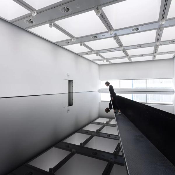 Installation view of Richard Wilson's 20:50 (1987) at Space Shifters, Hayward Gallery 2018. Photo: Mark Blower