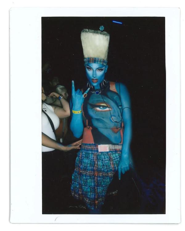 Photo of artist Lagoon Femshayma painted blue. 