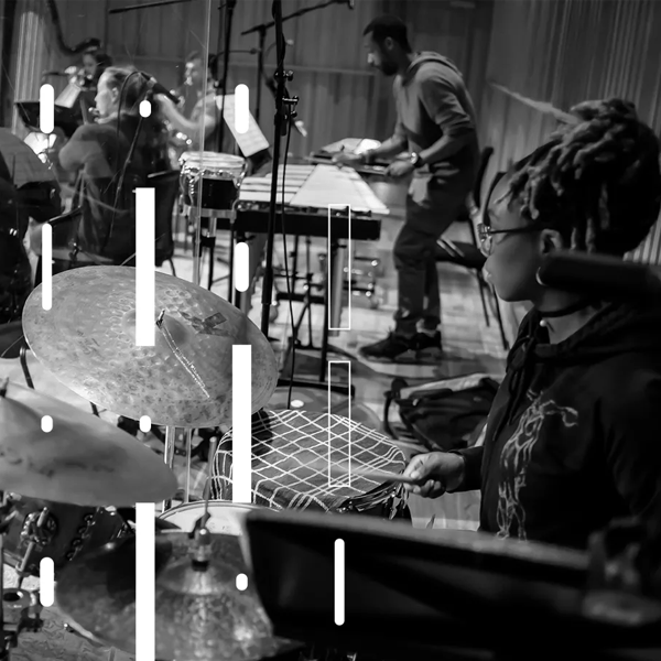 Close up of a female drummer and musicians performing in Music of the Unseen. Purcell Sessions  vertical line  design overlay the  photo