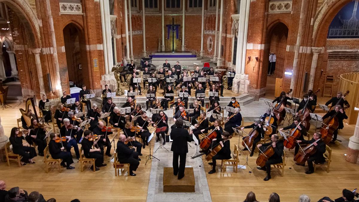  Lambeth Orchestra playing inside a red brick church