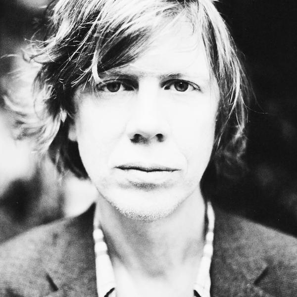 A black and white photo of Thurston Moore