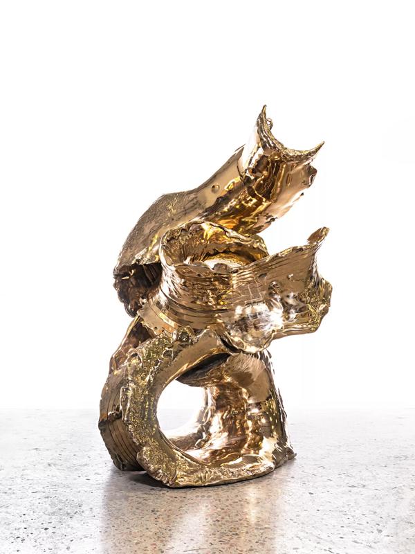 Gold twisting sculpture