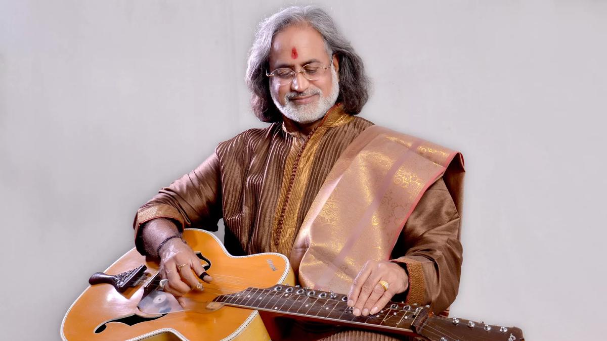  Sliding Guitarist Vishwa Mohan Bhatt with his guitar