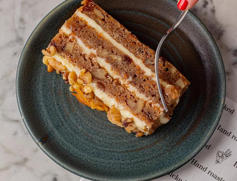 Photo of a slice of carrot cake on a plate