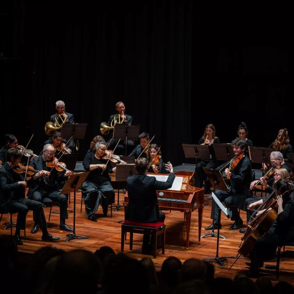 Orchestra of the Age of the Enlightenment perform around a harpsichordist