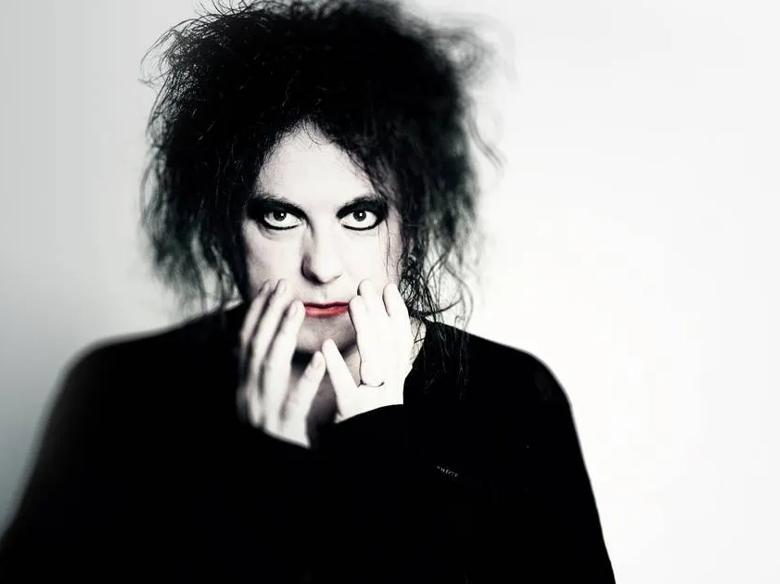 Robert Smith from the band The Cure.