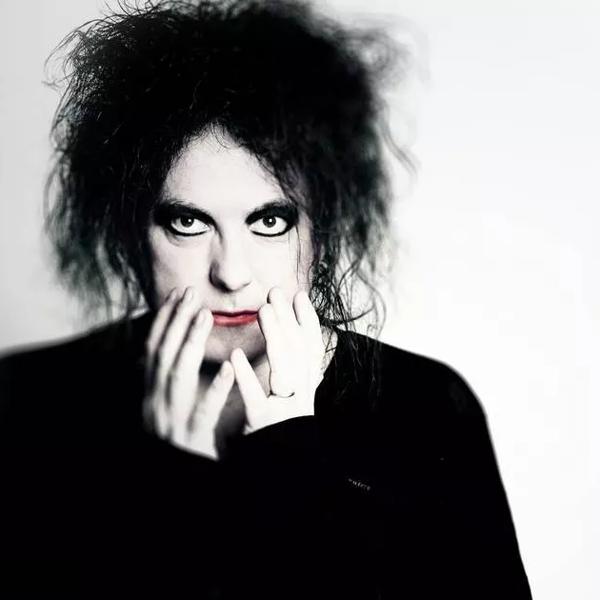 Robert Smith from the band The Cure.