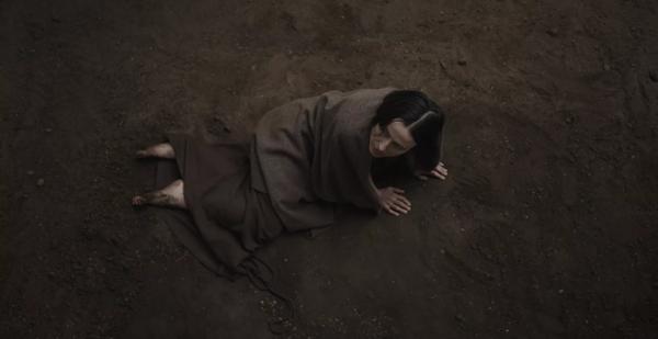 Bog Body, woman lying on the ground