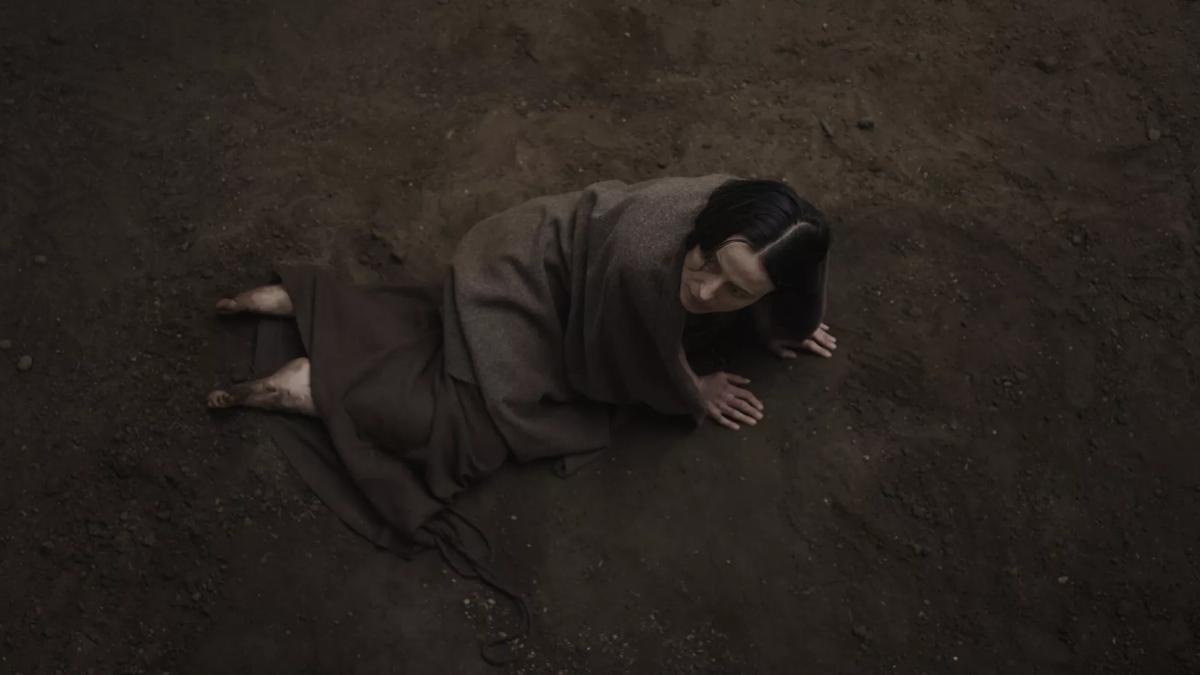Bog Body, woman lying on the ground