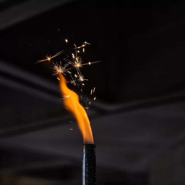 A red flame coming out of a pipe