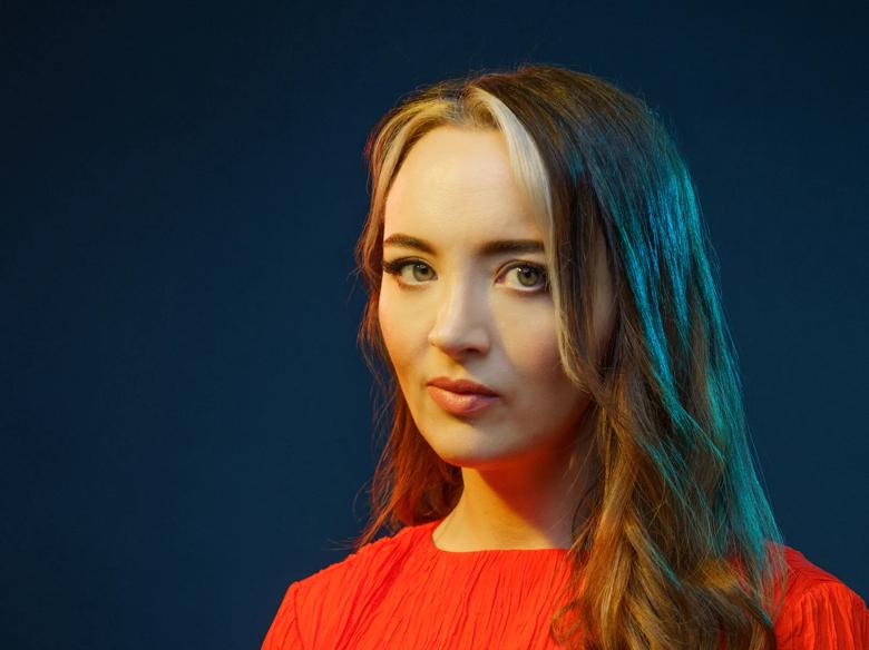 Comedian Fern Brady, wearing a red top