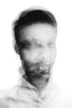 Black and white portrait of Afghan interpreter. Image is pixelated and blurred to allow for anonymity of the subject. 