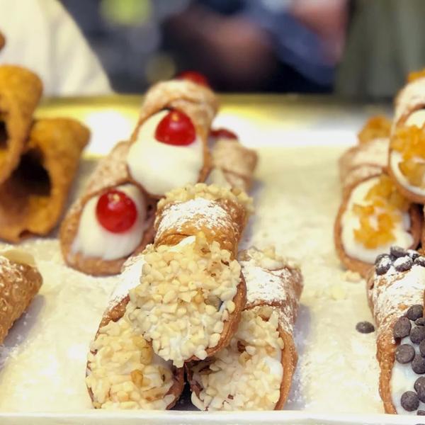 Photo of a tray of various flavoured cannoli made by Bello Gnocco at Southbank Centre Food Market