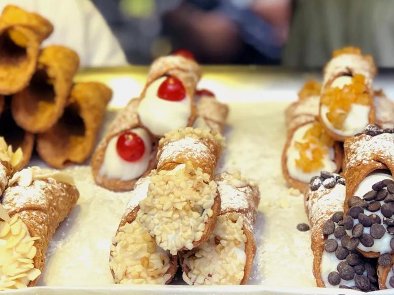 Photo of a tray of various flavoured cannoli made by Bello Gnocco at Southbank Centre Food Market